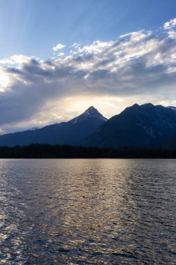 Lake, trees and mountains in Canadian Landscape. Chilliwack Lake, British Columbia, Canada. Nature Background.