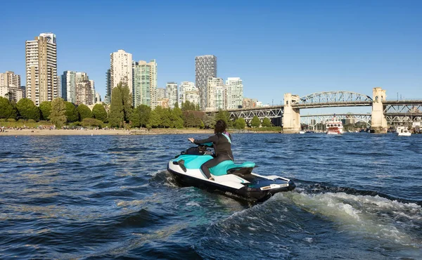 Adventurous Caucasian Woman Water Scooter Riding Ocean Sunny Sunset Sky — Stock fotografie