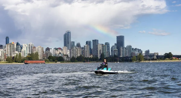 Adventurous Caucasian Woman Water Scooter Riding Ocean Modern City Background — Fotografia de Stock