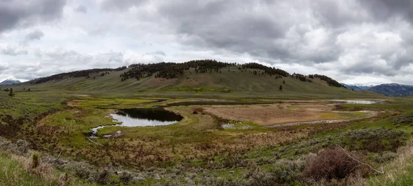 Lake and Mountain in the American Landscape. Yellowstone National Park, Wyoming. United States. Nature Background. Panorama