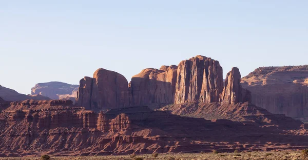 Desert Rocky Mountain American Landscape. Morning Sunny Sunrise Sky. Oljato-Monument Valley, Utah, United States. Nature Background