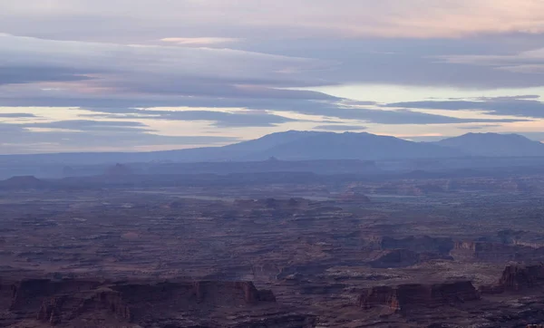 Scenic American Landscape and Red Rock Mountains in Desert Canyon. Spring Season. Canyonlands National Park. Utah, United States. Nature Background. Sunset