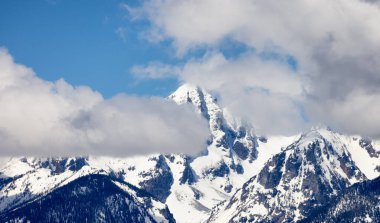 Snow Covered Mountains in American Landscape. Spring Season. Grand Teton National Park. Wyoming, United States. Nature Background.