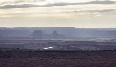 Scenic American Landscape and Red Rock Mountains in Desert Canyon. Spring Season. Canyonlands National Park. Utah, United States. Nature Background. Sunset