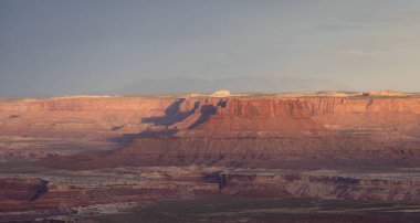 Scenic American Landscape and Red Rock Mountains in Desert Canyon. Spring Season. Canyonlands National Park. Utah, United States. Nature Background. Sunset