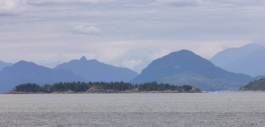 Howe Sound, Islands and Canadian Mountain Landscape Background. Taken near West Vancouver, British Columbia, Canada.