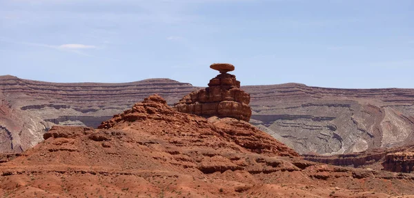 American Landscape in the Desert with Red Rock Mountain Formations. Mexican Hat, Utah, United States of America.
