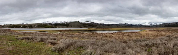 Lake and Mountain in the American Landscape. Yellowstone National Park, Wyoming. United States. Nature Background. Panorama