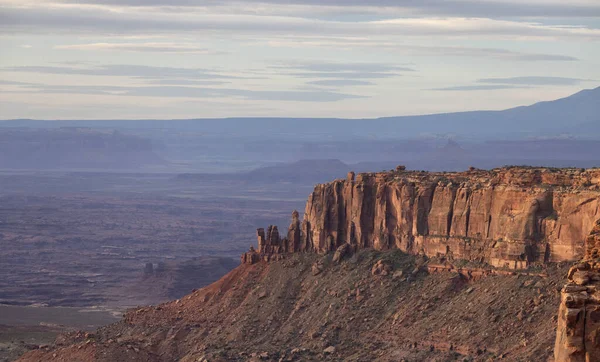 Scenic American Landscape and Red Rock Mountains in Desert Canyon. Spring Season. Canyonlands National Park. Utah, United States. Nature Background. Sunrise