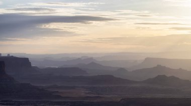 Scenic American Landscape and Red Rock Mountains in Desert Canyon. Spring Season. Canyonlands National Park. Utah, United States. Nature Background. Sunset