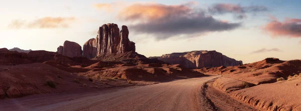 Desert Rocky Mountain American Landscape. Colorful Sunrise Sky Art Render. Oljato-Monument Valley, Utah, United States. Nature Background Panorama