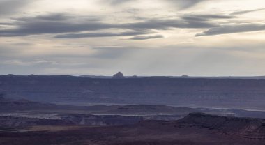 Scenic American Landscape and Red Rock Mountains in Desert Canyon. Spring Season. Canyonlands National Park. Utah, United States. Nature Background. Sunset