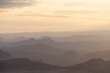 Scenic American Landscape and Red Rock Mountains in Desert Canyon. Spring Season. Canyonlands National Park. Utah, United States. Nature Background. Sunset