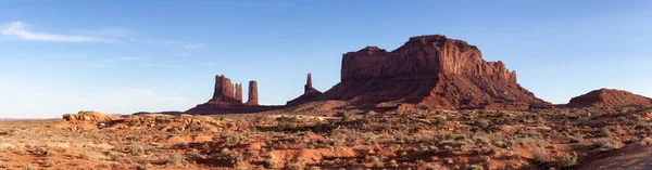 Desert Rocky Mountain American Landscape. Sunny Blue Sky Day. Oljato-Monument Valley, Utah, United States. Nature Background Panorama