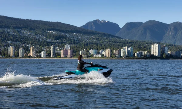 Adventurous Caucasian Woman Water Scooter Riding Ocean Modern City Mountains — Fotografia de Stock