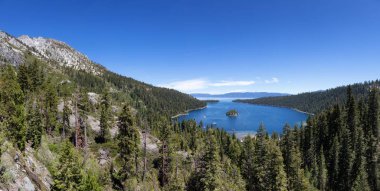 Panoramic View of Large Bay and Lake with Boats, Small Island, Trees and Mountains. Summer Season. Emerald Bay, Lake Tahoe. California, United States. Nature Background. Panorama