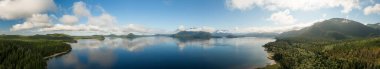 Aerial Panoramic View of Kennedy Lake during a vibrant sunny day. Located on the West Coast of Vancouver Island near Tofino and Ucluelet, British Columbia, Canada.