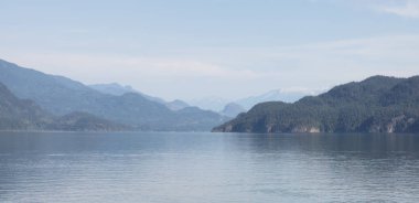 Harrison Lake during Sunny Summer Morning. Canadian Nature Landscape Background. Harrison Hot Springs, British Columbia, Canada.