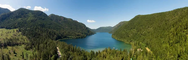 Aerial Panoramic View of Cameron Lake during a vibrant sunny day. Vancouver Island, British Columbia, Canada. Canadian Nature Background