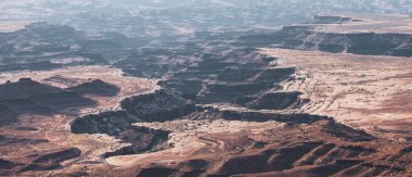 Scenic American Landscape and Red Rock Mountains in Desert Canyon. Spring Season. Canyonlands National Park. Utah, United States. Nature Background. Sunrise