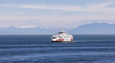 British Columbia, Canada - July 14, 2022: BC Ferries Passing By the Strait of Georgia on the West Coast of Pacific Ocean.