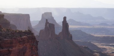 Scenic American Landscape and Red Rock Mountains in Desert Canyon. Spring Season. Canyonlands National Park. Utah, United States. Nature Background. Sunrise Light