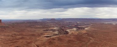 Scenic Panoramic View of American Landscape and Red Rock Mountains in Desert Canyon. Colorful Sky. Canyonlands National Park. Utah, United States. Nature Background Panorama