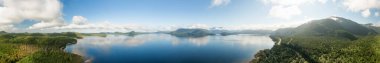 Aerial Panoramic View of Kennedy Lake during a vibrant sunny day. Located on the West Coast of Vancouver Island near Tofino and Ucluelet, British Columbia, Canada.