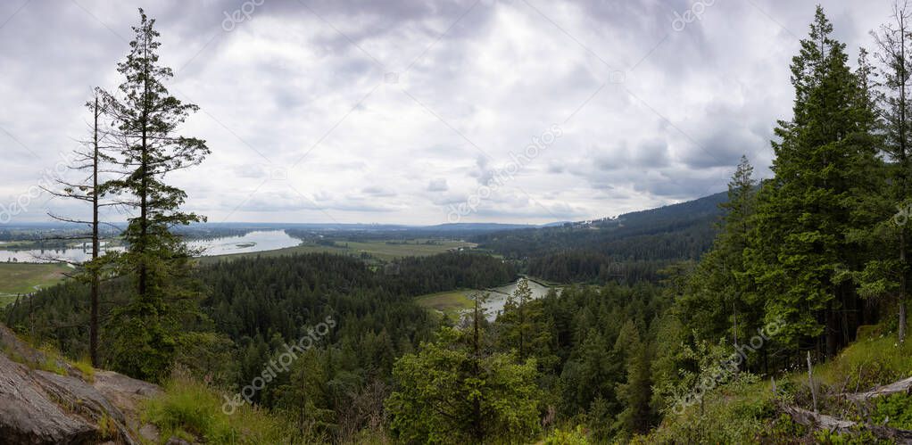 Panoramic View of Canadian Nature Landscape with city in background. Minnekhada Regional Park, Coquitlam, Vancouver, British Columbia, Canada. Background Panorama