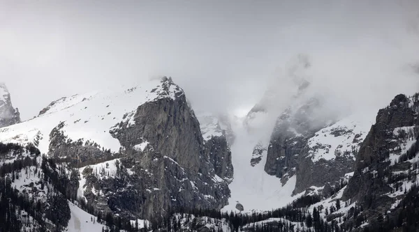 Snow Covered Mountains in American Landscape. Spring Season. Grand Teton National Park. Wyoming, United States. Nature Background.