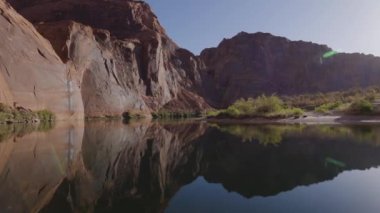 Colorado River in Glen Canyon, Arizona, United States of America. American Mountain Nature Landscape Background. Sunny Sunrise. Slow Motion