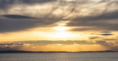 Cloudy Cloudscape during sunny summer Day on the West Coast of Pacific Ocean. British Columbia, Canada. Sunset Sky