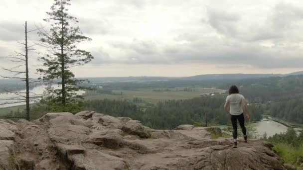 Adventurous Woman Standing Top Rock Overlooking Canadian Nature Landscape Minnekhada — Stok video