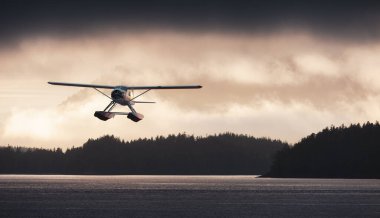 Seaplane Flying over the West Coast Pacific Ocean. Adventure Composite. 3D Rendering Airplane. Background Image from Tofino, Vancouver Island, British Columbia, Canada. Dramatic Sunset