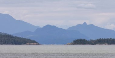 Howe Sound, Islands and Canadian Mountain Landscape Background. Taken near West Vancouver, British Columbia, Canada.
