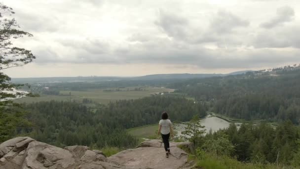 Adventurous Woman Standing Top Rock Overlooking Canadian Nature Landscape Minnekhada — Vídeos de Stock