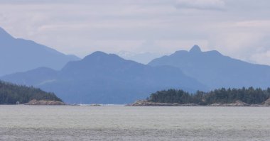 Howe Sound, Islands and Canadian Mountain Landscape Background. Taken near West Vancouver, British Columbia, Canada.
