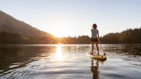 Adventurous Woman Paddling Paddle Board Peaceful Lake Sunny Sunset Hicks — Fotografia de Stock