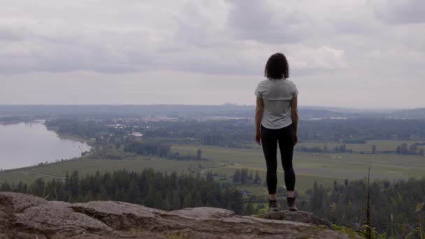 Adventurous Woman Standing Top Rock Overlooking Canadian Nature Landscape Minnekhada — Stockvideo