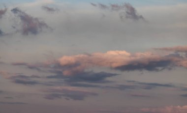 Puff Clouds in the Sky during sunset. Zoom in. Cloudscape Background. British Columbia, Canada.