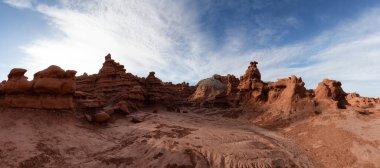 Red Rock Formations in Desert at Sunny Sunrise. Spring Season. Goblin Valley State Park. Utah, United States. Nature Background Panorama