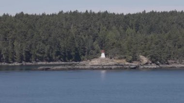 Islands surrounded by ocean and mountains. Summer Season. Gulf Islands near Vancouver Island, British Columbia, Canada. Canadian Landscape.