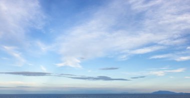 Cloudy Cloudscape during sunny summer Day on the West Coast of Pacific Ocean. British Columbia, Canada. Sunset Sky