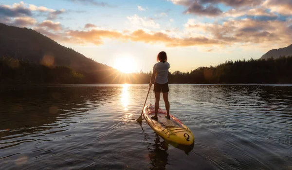 Adventurous Woman Paddling Paddle Board Peaceful Lake Colorful Sunset Art — Fotografia de Stock