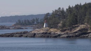Islands surrounded by ocean and mountains. Summer Season. Gulf Islands near Vancouver Island, British Columbia, Canada. Canadian Landscape.