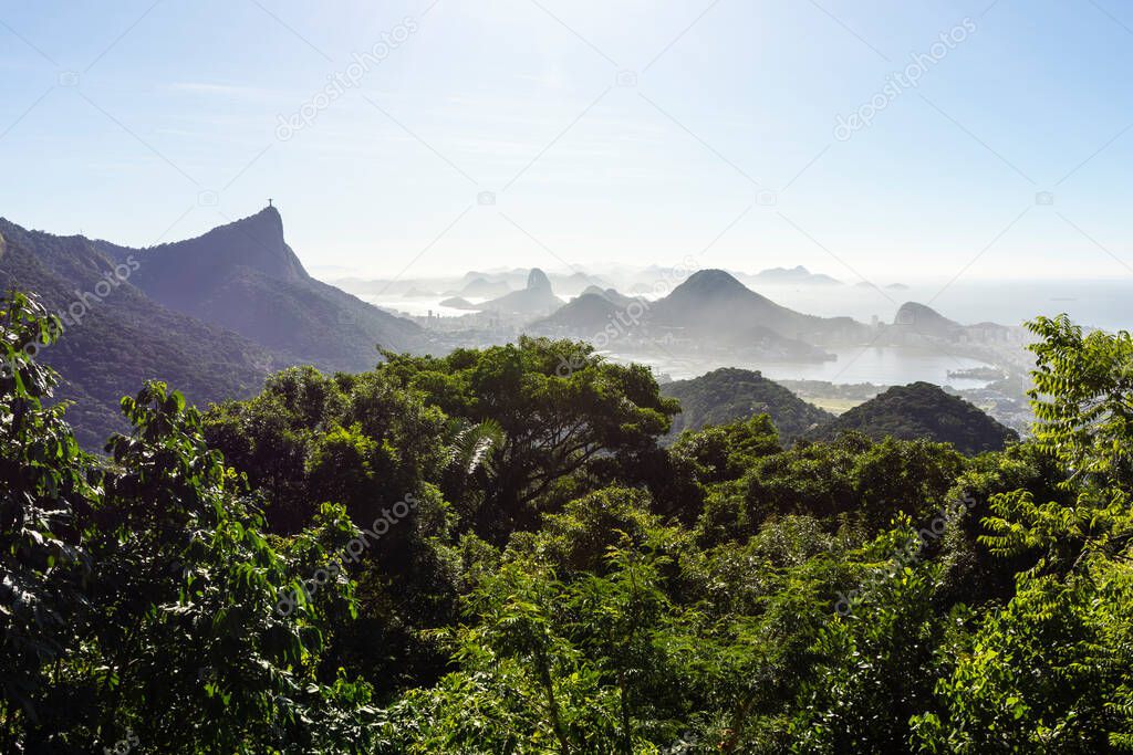Beautiful sunrise view to rainforest mountains and city, Rio de Janeiro, Brazil