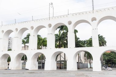 Beautiful view to white old historic aqueduct in downtown Lapa district, Rio de Janeiro, Brazil
