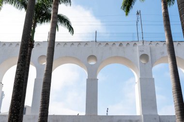 Beautiful view to white old historic aqueduct in downtown Lapa district, Rio de Janeiro, Brazil