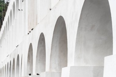 Beautiful view to white old historic aqueduct in downtown Lapa district, Rio de Janeiro, Brazil