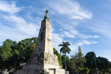 Beautiful view to central monument with statue on green public square, Rio de Janeiro, Brazil